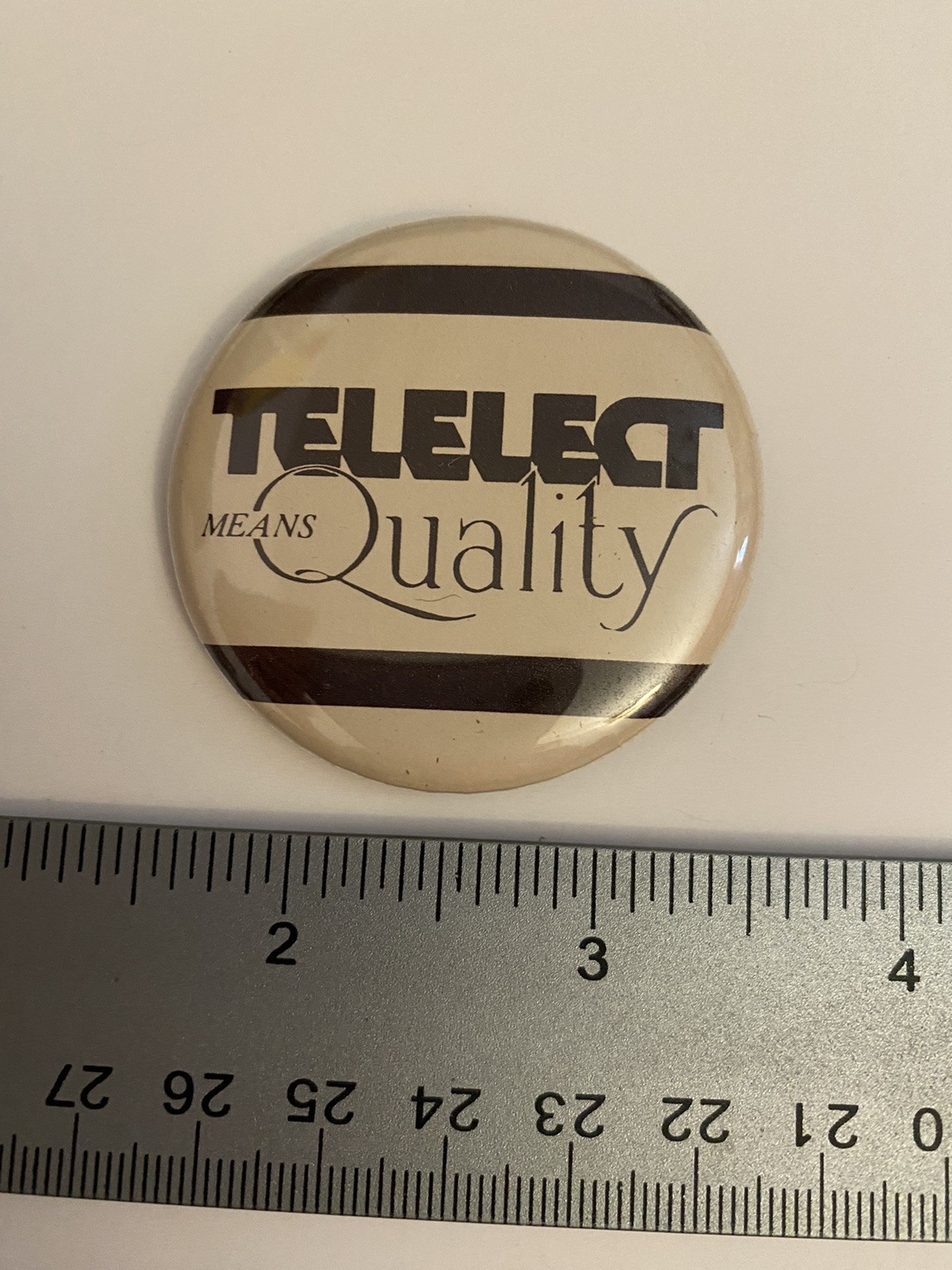 Telelect Means Quality Pin Back Button P86