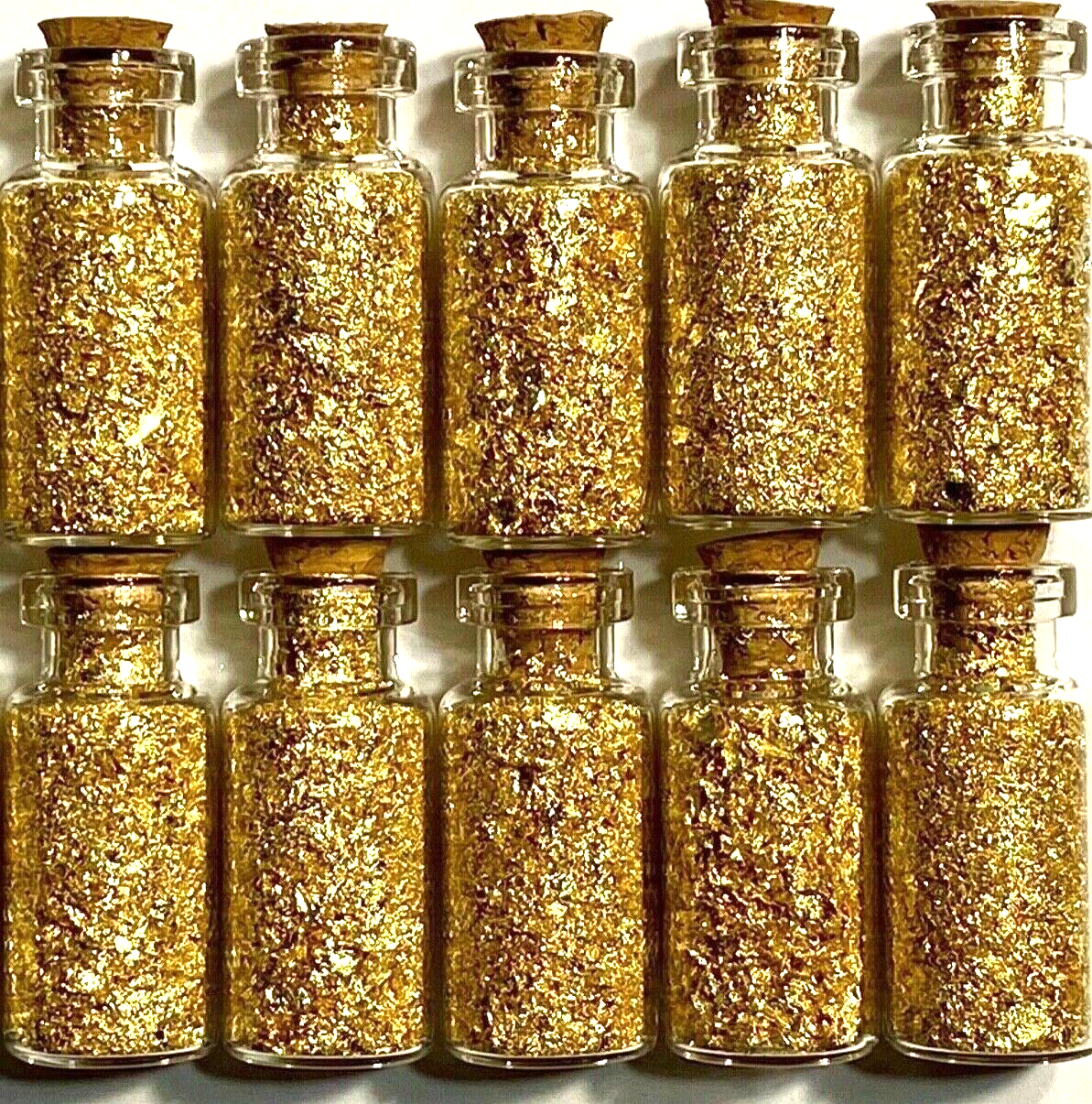9 Bottles of Large Gold Flakes .....