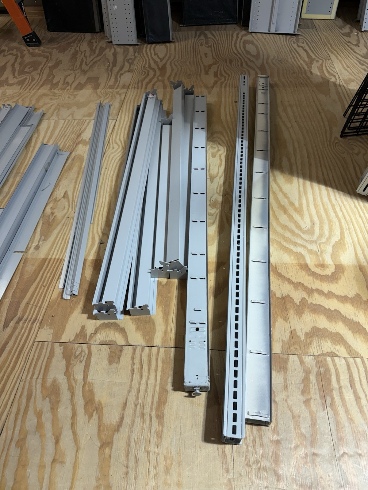 HUGE lot of pallets of Used Lozier Shelving shelves, components, glass cases