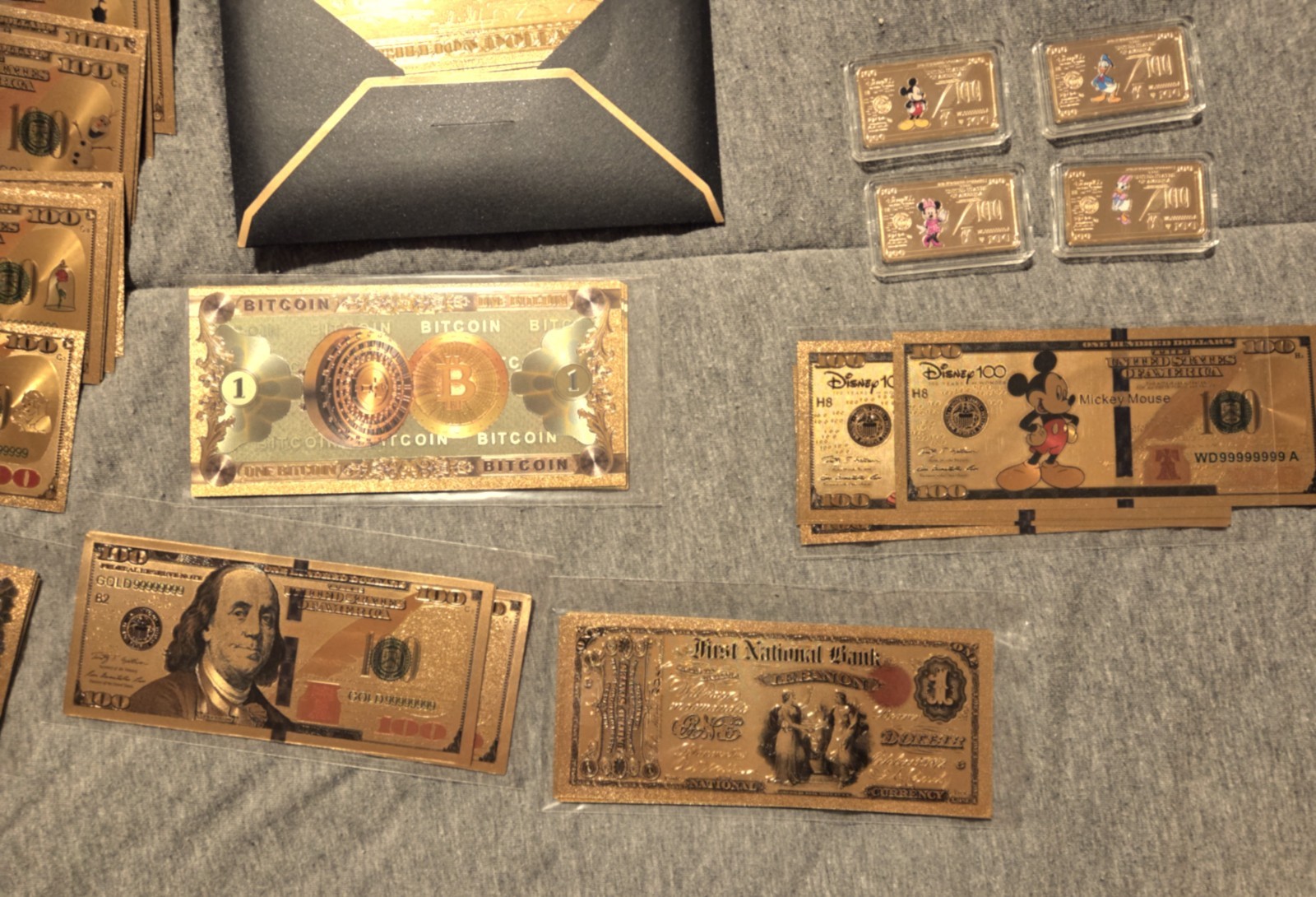 Lot of 80 novelty US coins and bills.