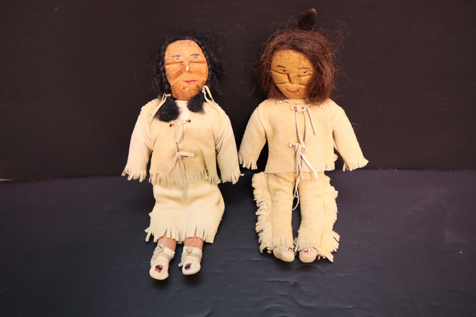 Antique Pair of NATIVE AMERICAN SIOUX Indian Wood Carved Leather Hide Dolls