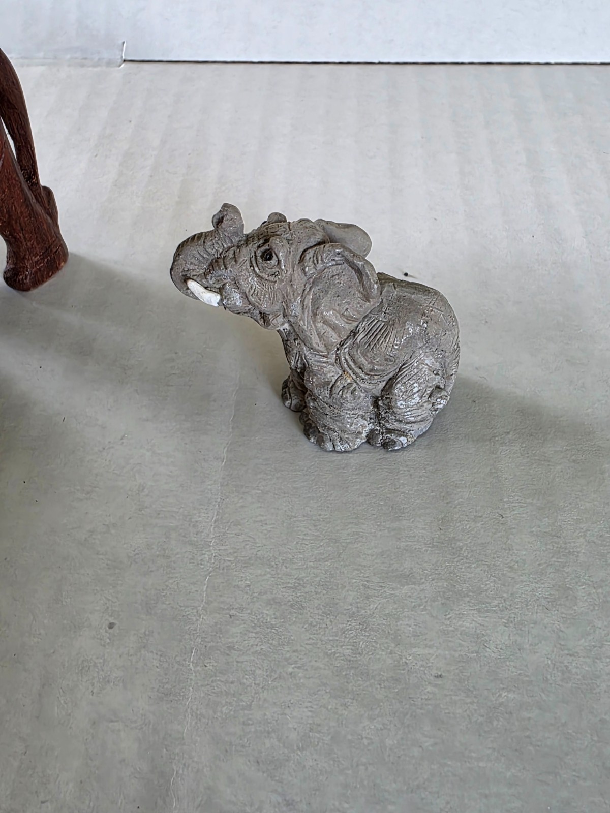 Three elephant figurines