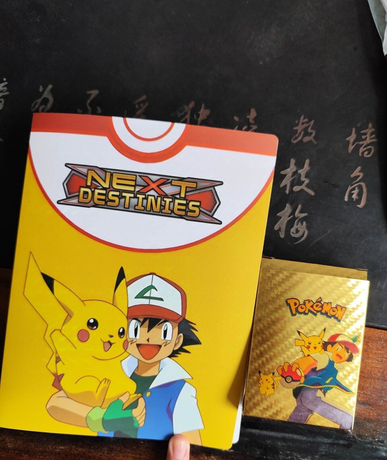 55 randomized Pokémon cards + booklet with 120 cards 4 cards per page New!