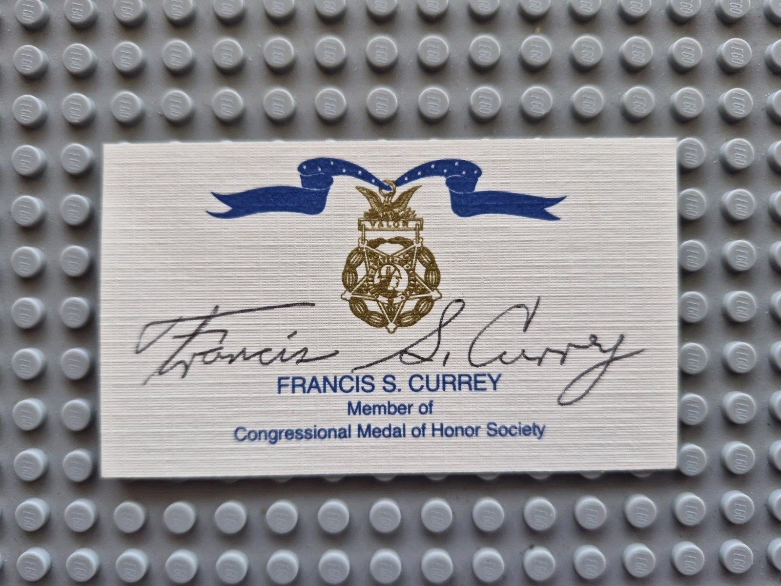 Francis S Currey,  WW2  MOH. Battle Of The Bulge. Signed Business Card.