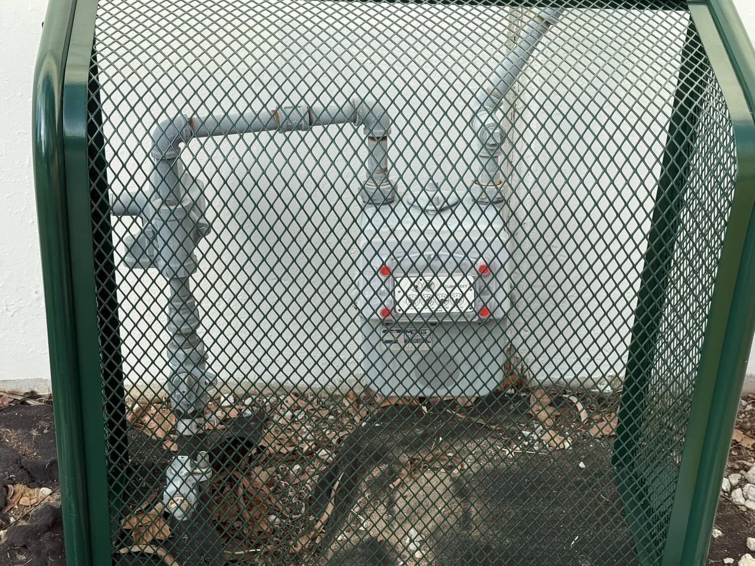 Wall-Mounted Backflow Security Cage – Backflow Enclosure (Green) - Sandbaggy