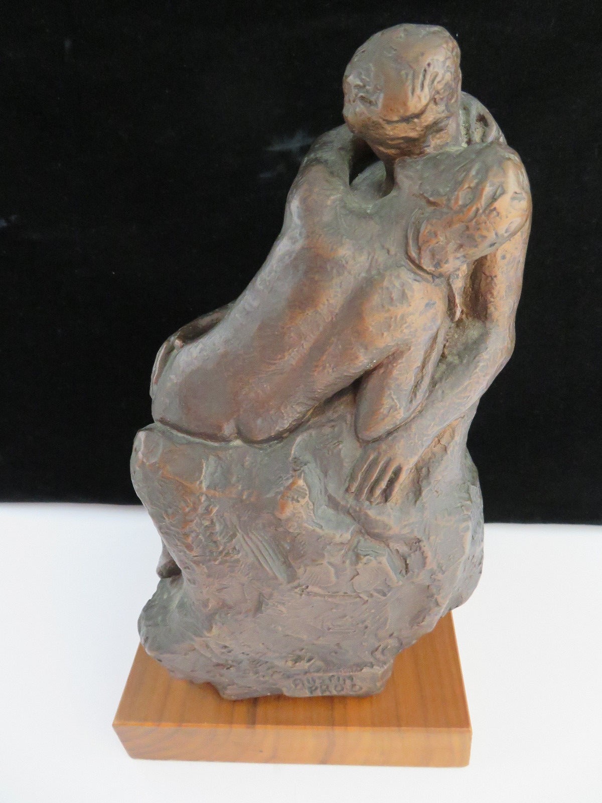 The Kiss Molded Statue on Wood Base