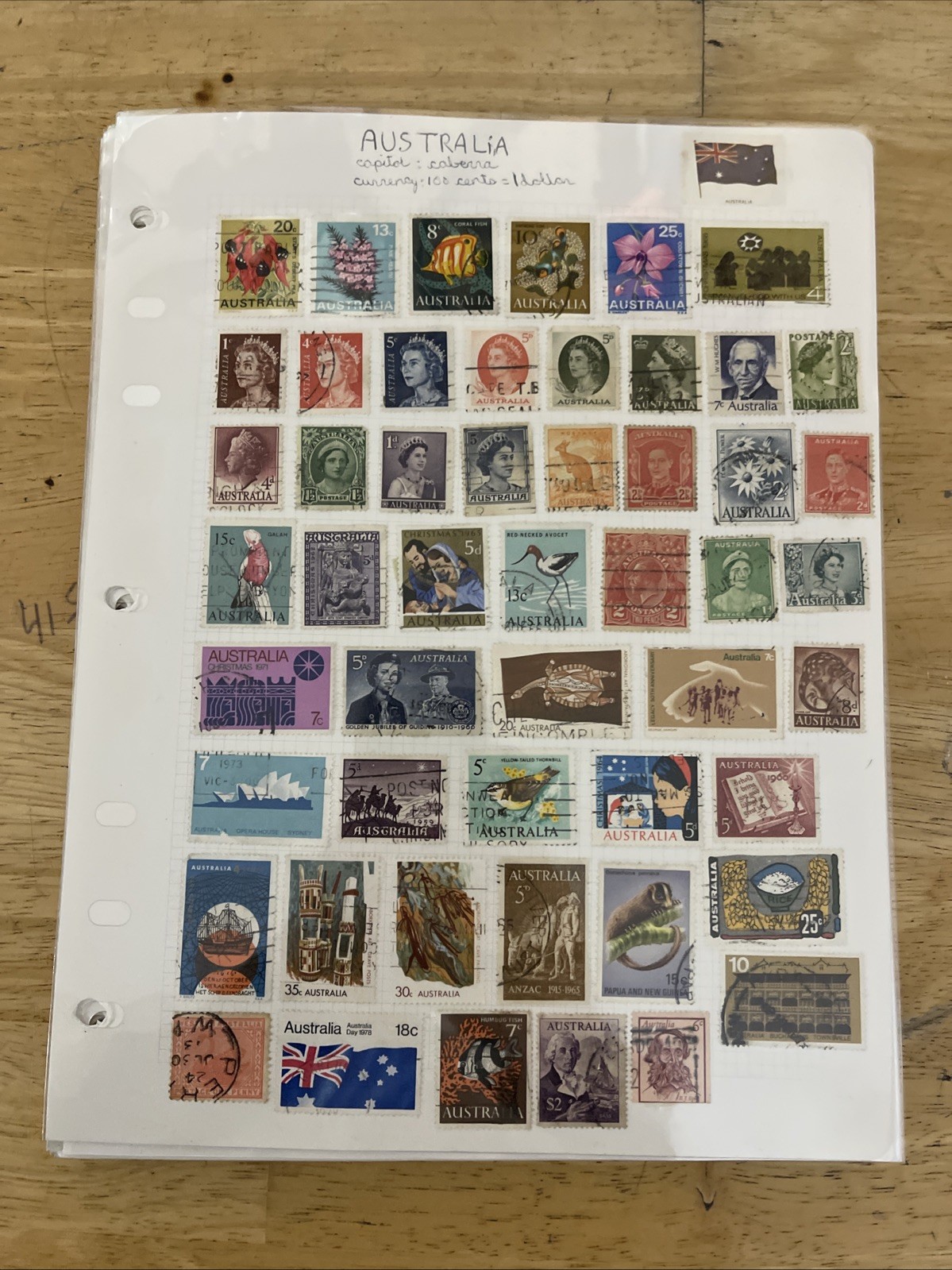 Lot of new and used stamps from all over the world. ON Paper.