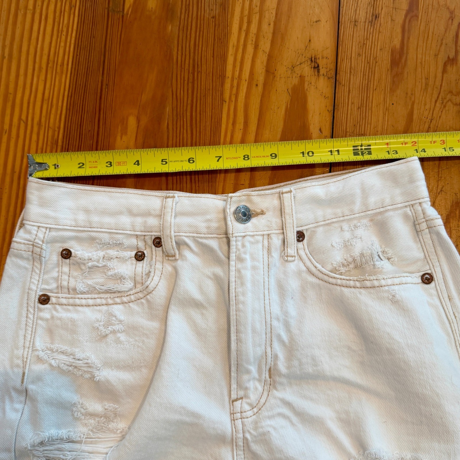 American Eagle White Distressed High Waisted Denim Shorts Size 4 Raw Hem