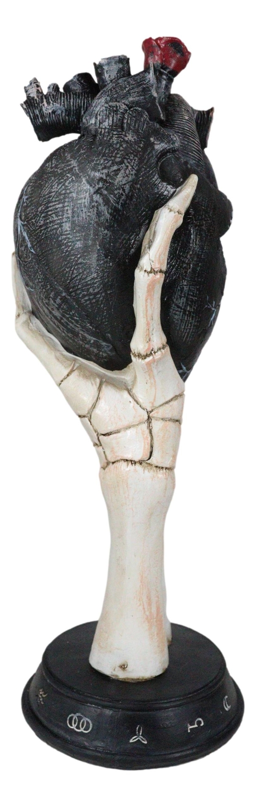 Gothic Alchemy Skeleton Hand Holding Black Anatomy Heart With Evil Eye Figurine