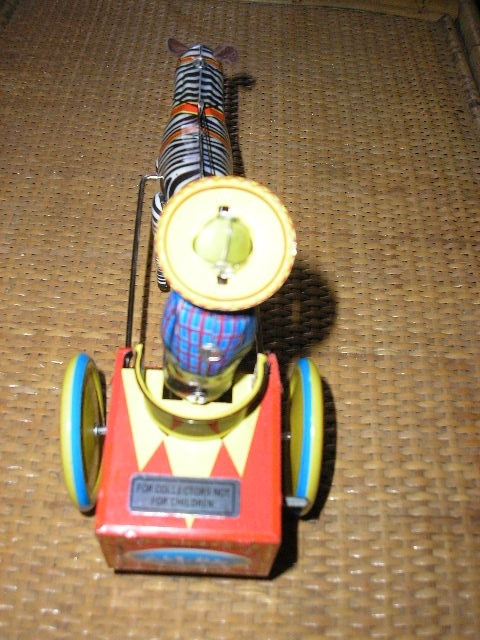 ZEBRA Tin TOY wind up cowboy & cart based on german Galop toy Schylling