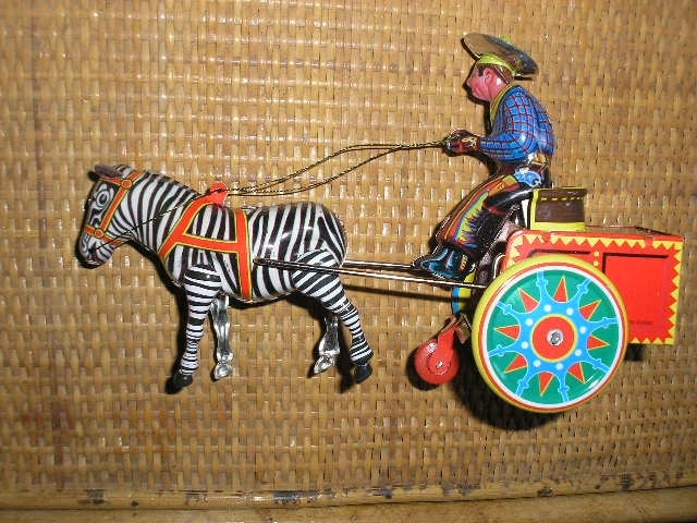 ZEBRA Tin TOY wind up cowboy & cart based on  german Galop toy Schylling