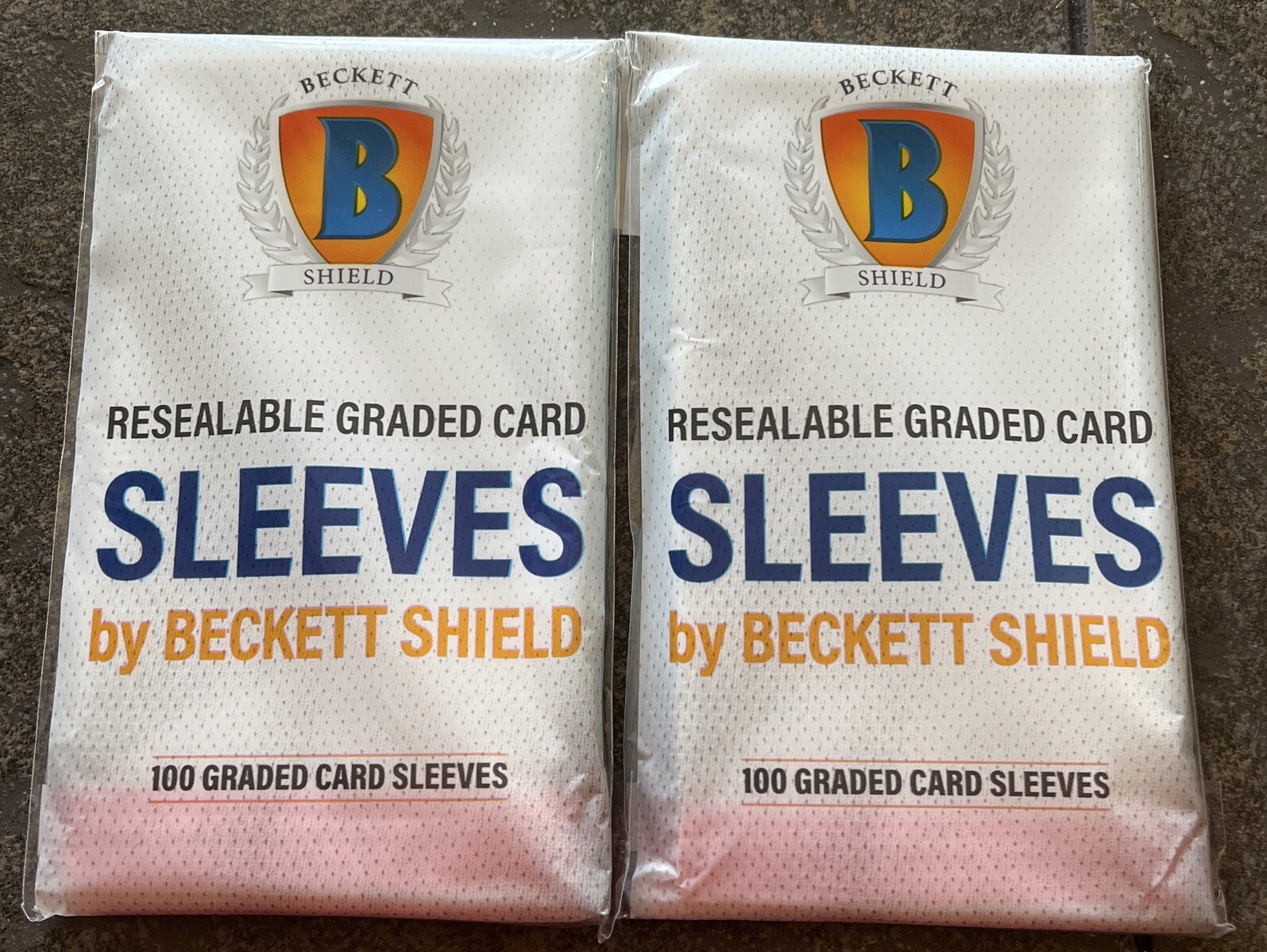 Pair of (2) Beckett Shield Graded Card Sleeves - Pack of 100
