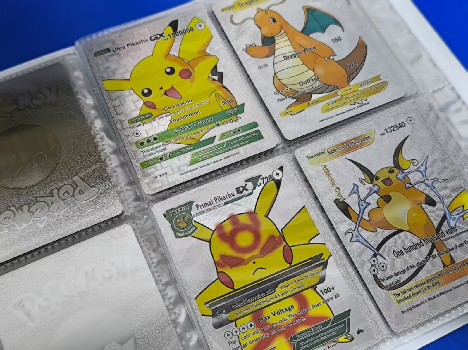 55 randomized Pokémon cards + booklet with 120 cards 4 cards per page New!