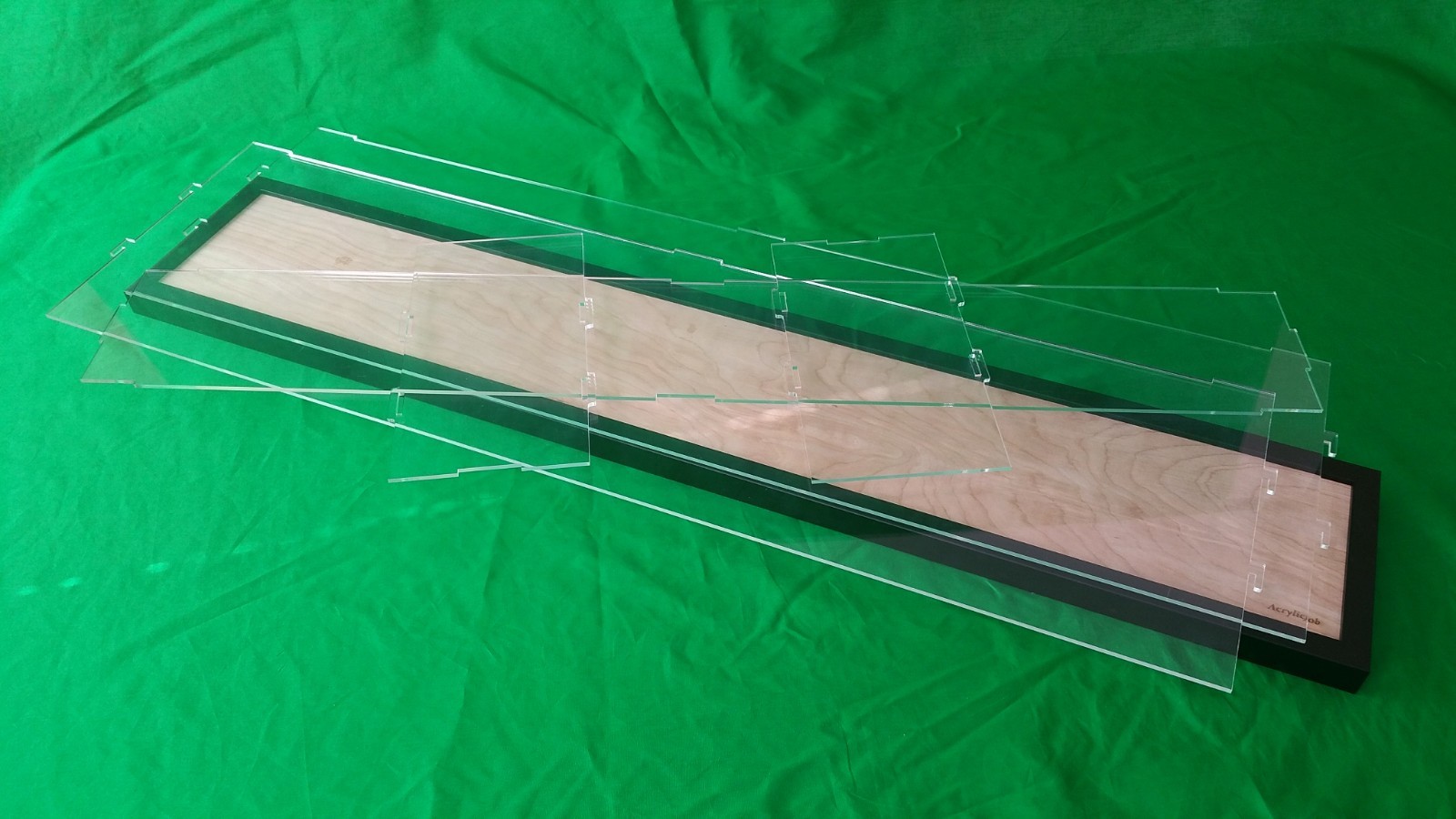 36"L x 10"W x 12"H Display case with 3/16" thick acrylic black wood frame base