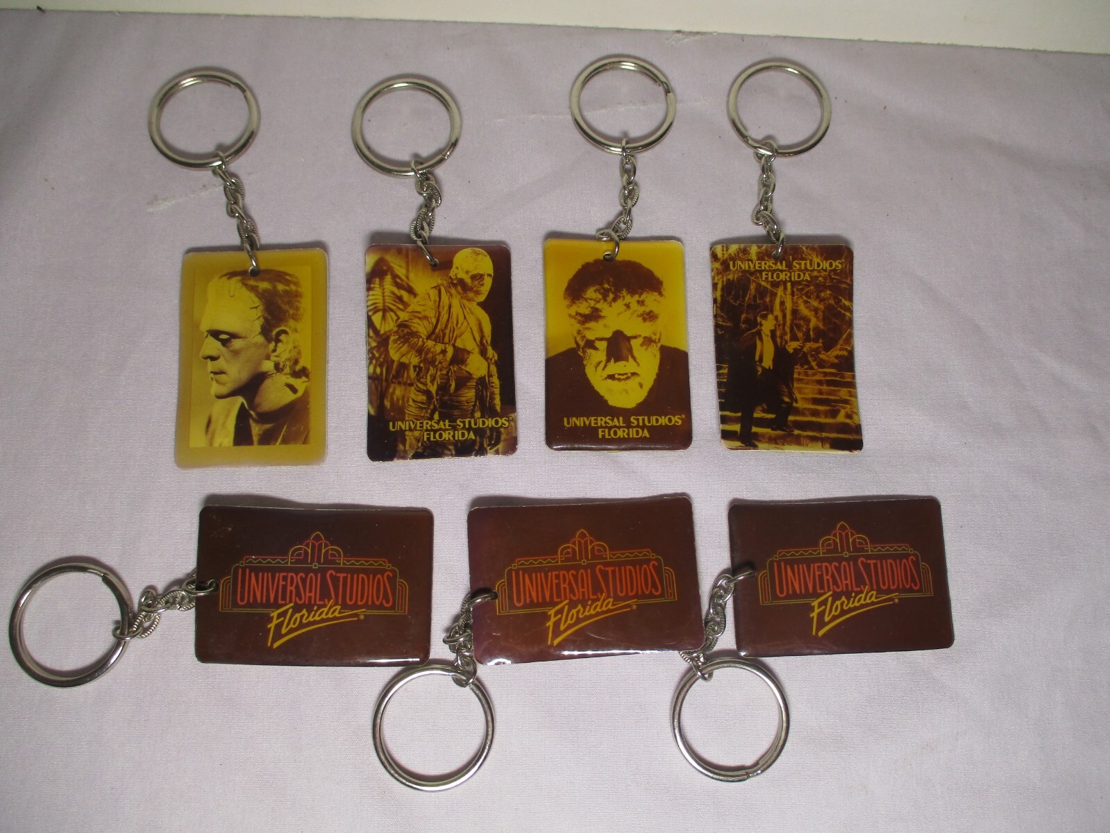 1991 Lot 7 UNIVERSAL STUDIOS FLA MONSTER KeyChains FRANKENSTEIN Wolfman DRACULA