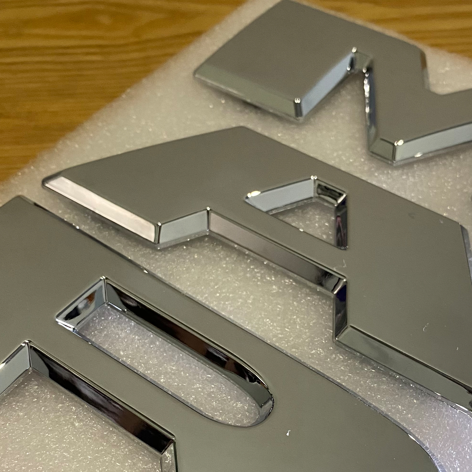 Front Grilles Emblem Letter For 2019-2023 RAM 1500 Grill Badge Chrome 68311411AA