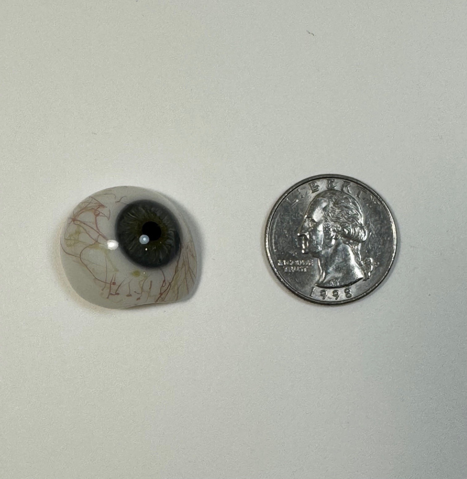 Antique German hand-blown human prosthetic glass eye. Bloodshot eye. Blue.