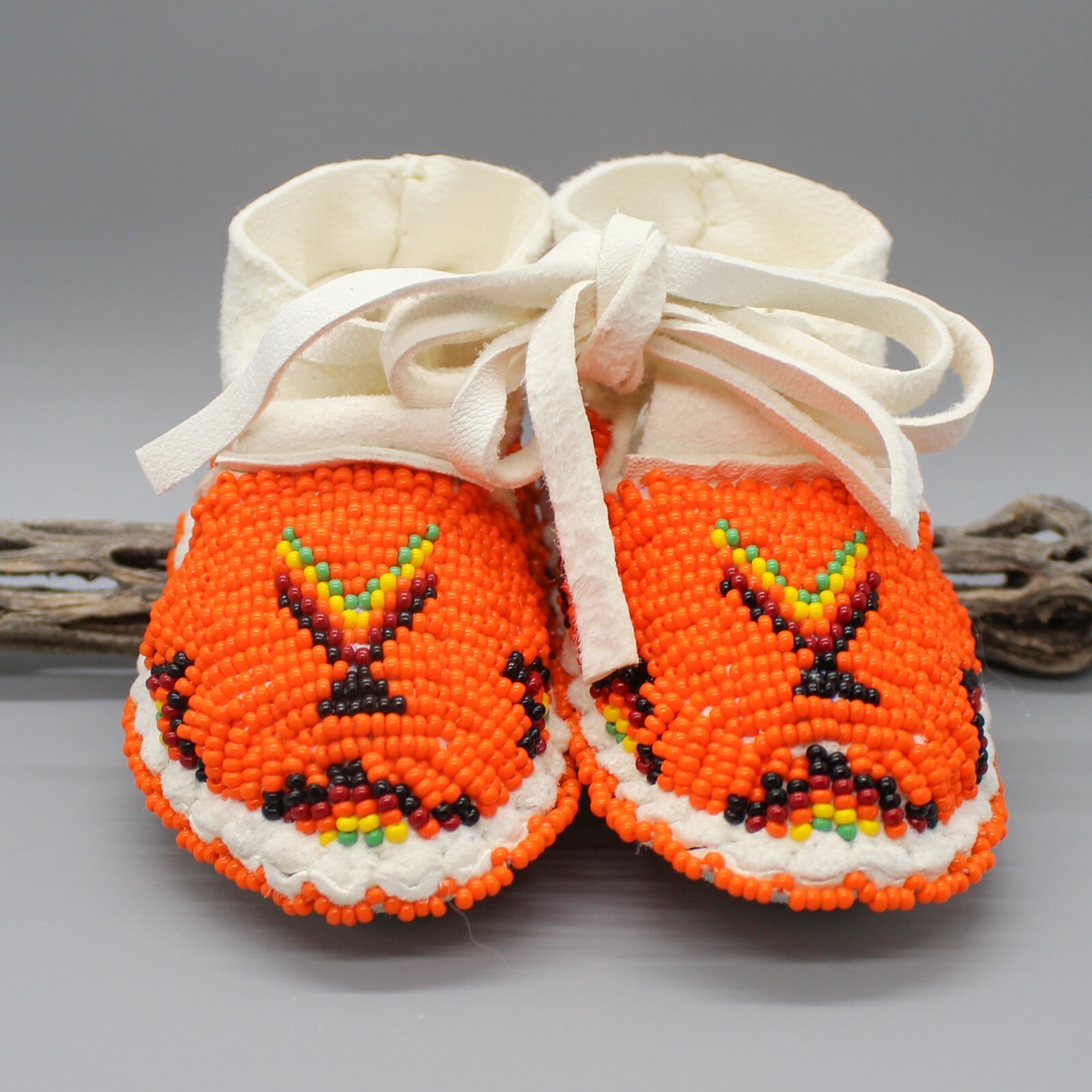 CHEYENNE-FULLY BEADED WHITE LEATHER BABY MOCCASINS by JANET WHITEMAN