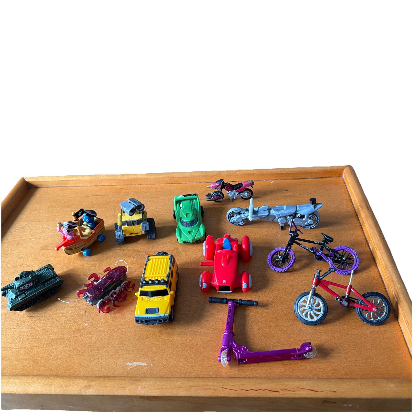 Mix lot of various miniature toy vehicles and action figures.