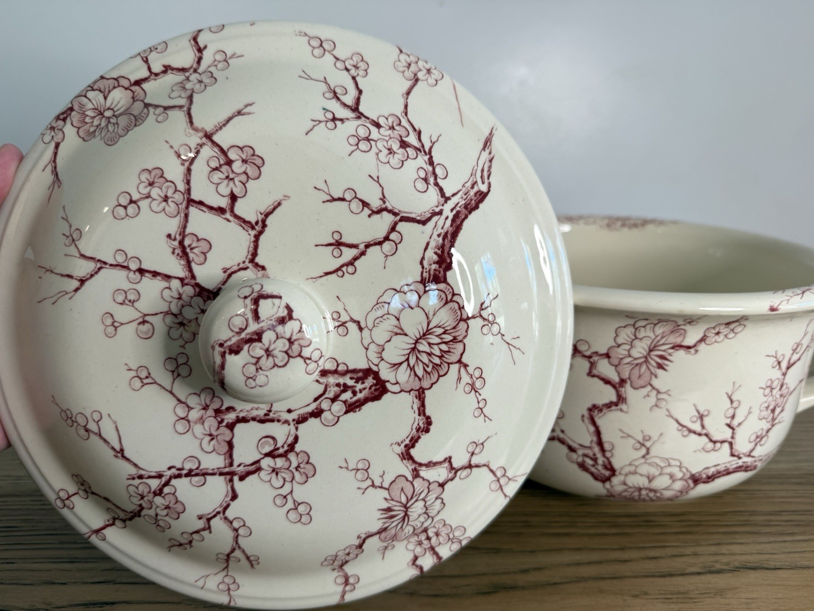 Antique Chamber Pot With A Red Transferware Pattern