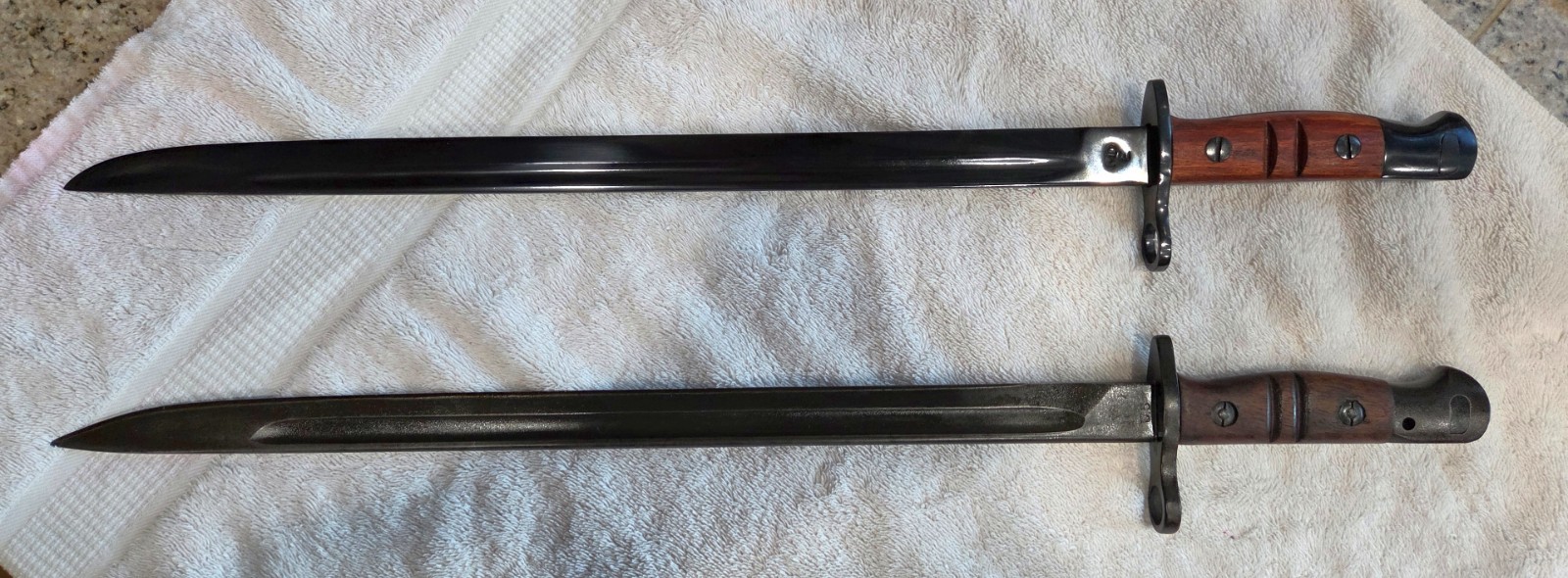 Real U.S. WWI Winchester Built M1917 Enfield Bayonet and a Repro also