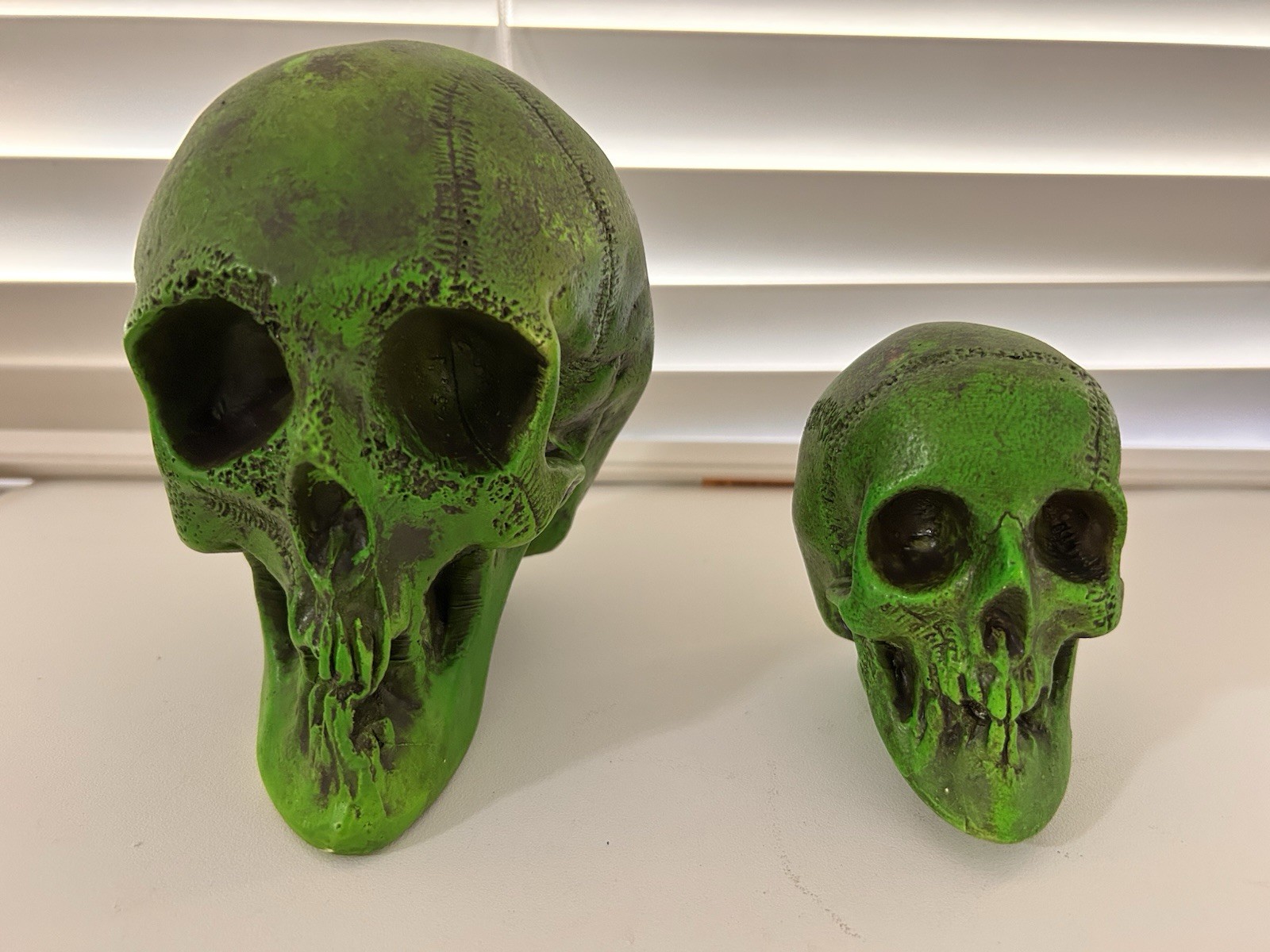 2 EA. RANDOTTI ORIGINAL FLUORESCENT GREEN LARGE & MEDIUM SKULLS STILL GLOW