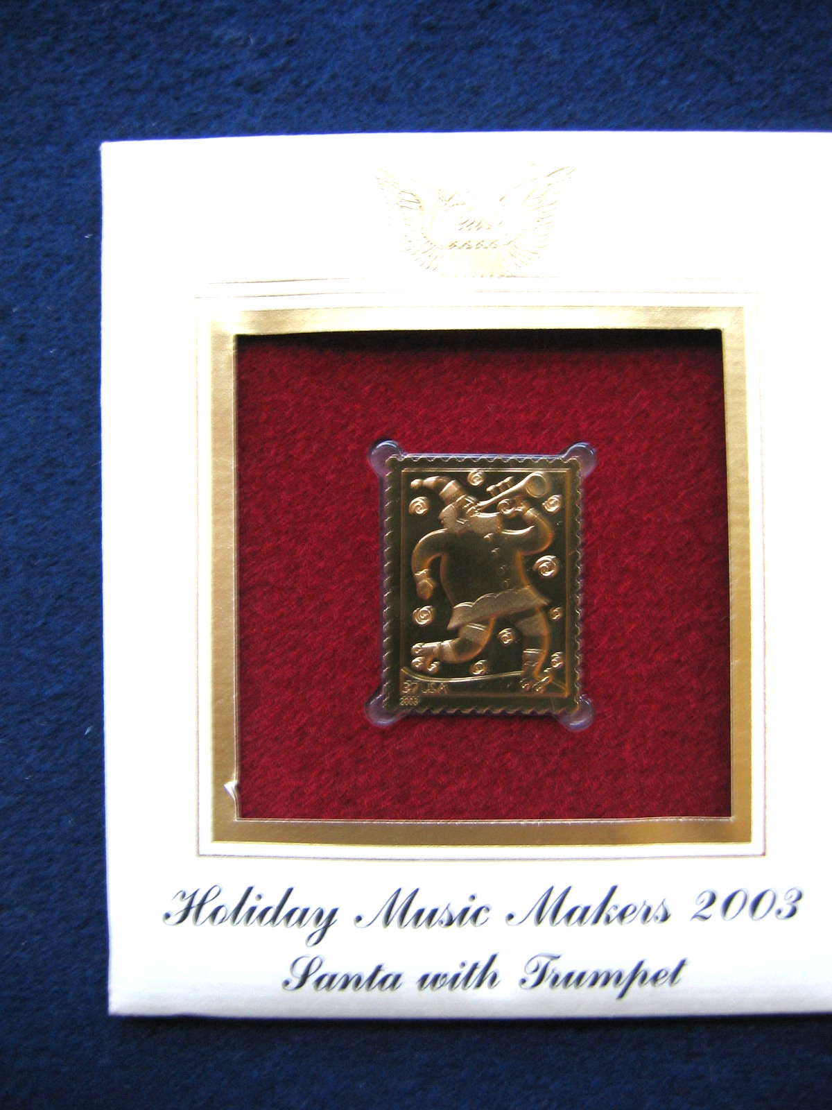 2003 Holiday Music Makers Santa With Trumpet replica Gold Golden Cover Stamp