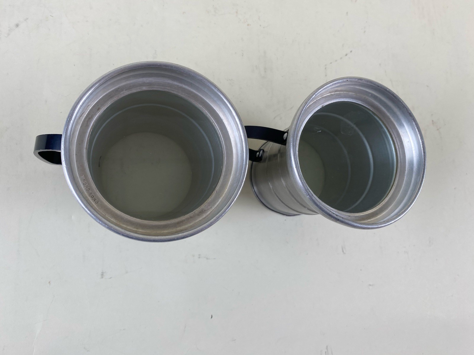 Pair Apex Aluminum Pewter Beer Steins Mugs w Glass Bottom Black Handle Hong Kong