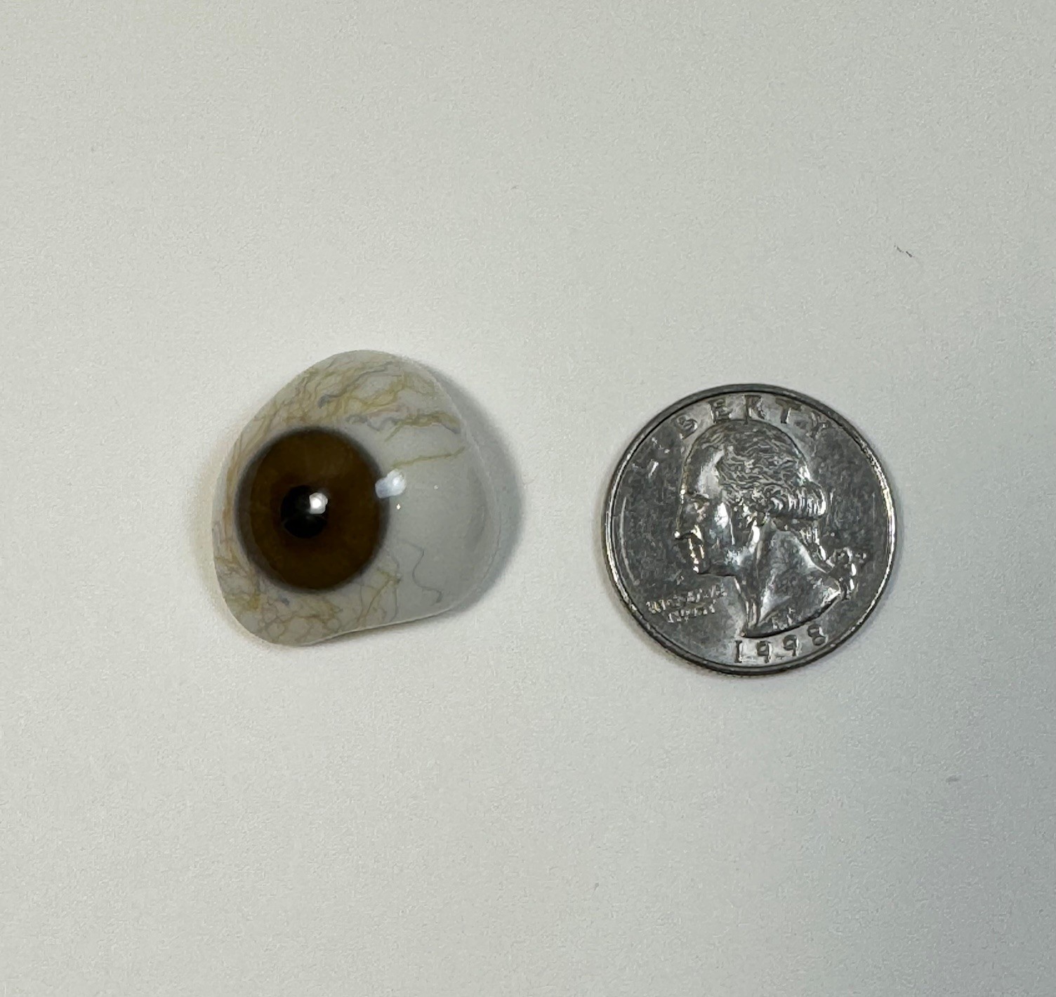 Antique German hand-blown human prosthetic glass eye. Bloodshot eye. Brown.