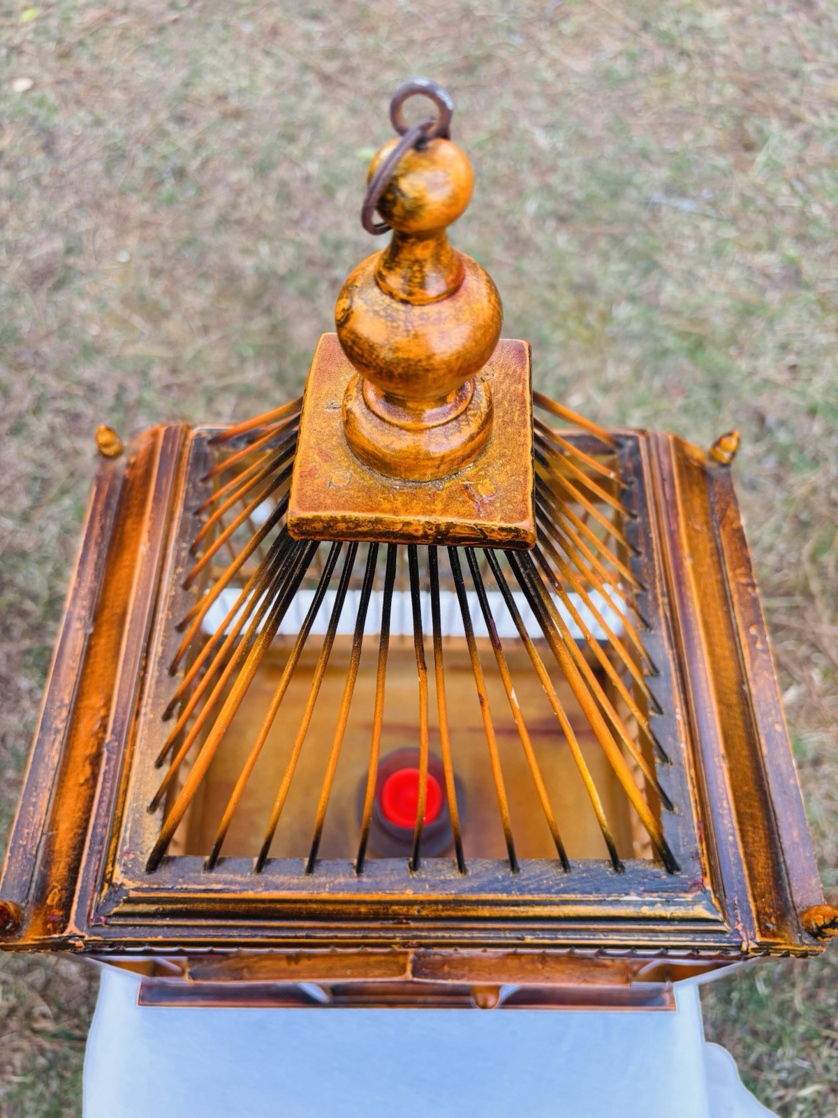 Wood Birdhouse with a pagoda-style top and intricate architectural details