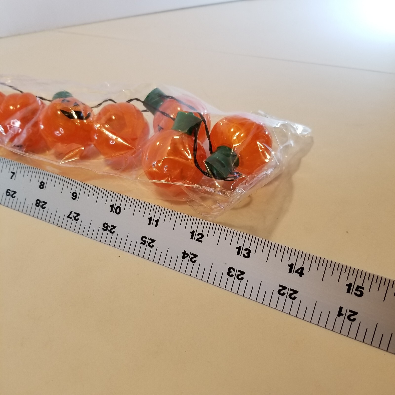 Light up Pumpkin Jack O Lantern Necklace Halloween 9 Bright LEDs 3 Flash modes.