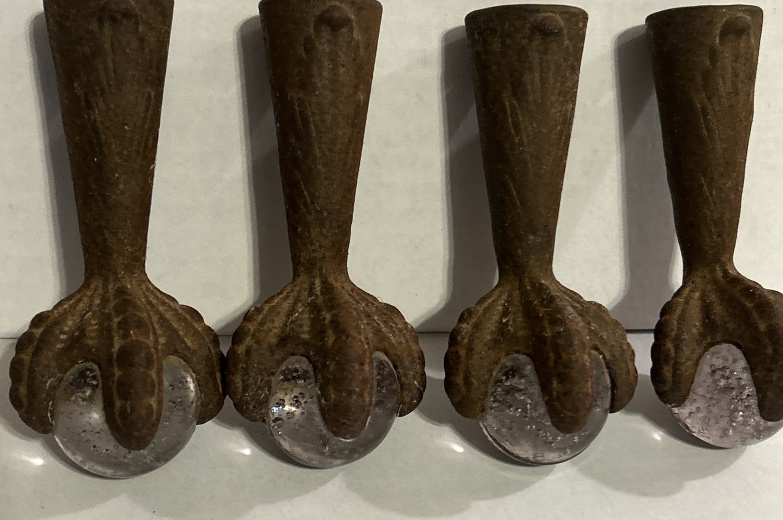 Set of 4 Vintage Art Deco Cast Iron Glass Claws and Ball Furniture Feet Casters