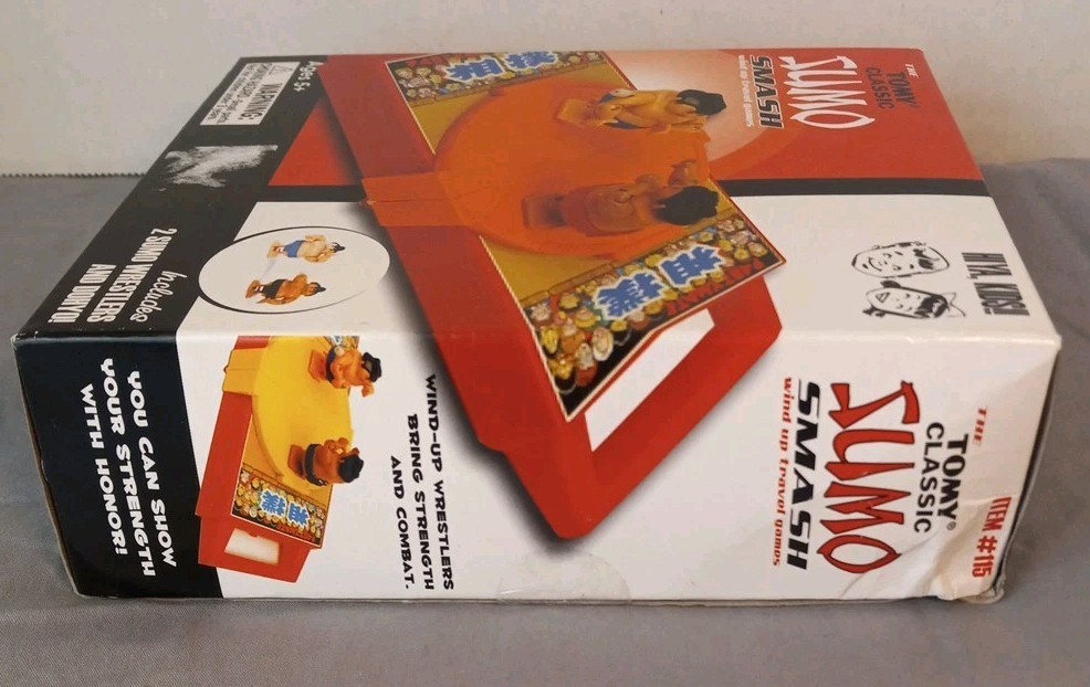 Tomy Classics Sumo Smash Wind Up Travel Game 2009 Bazoo Global New W Box Damage