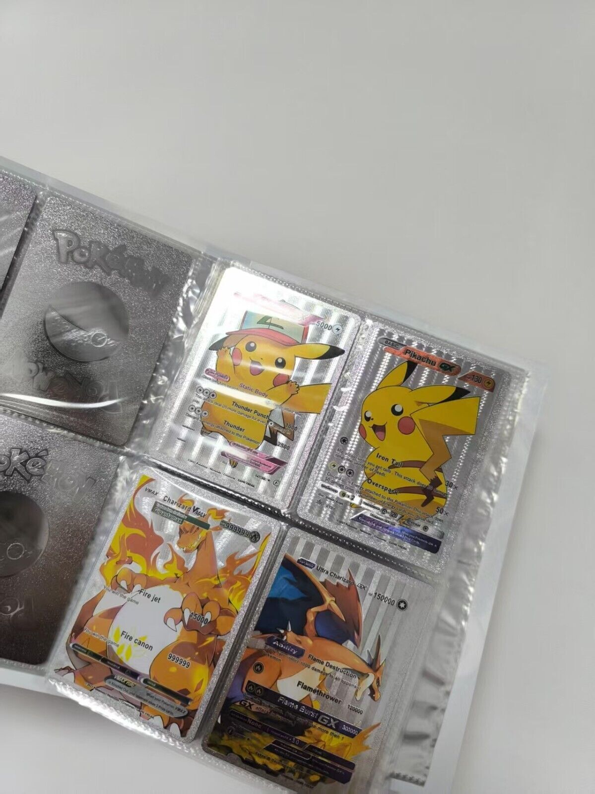 55 randomized Pokémon cards + booklet with 120 cards 4 cards per page New!