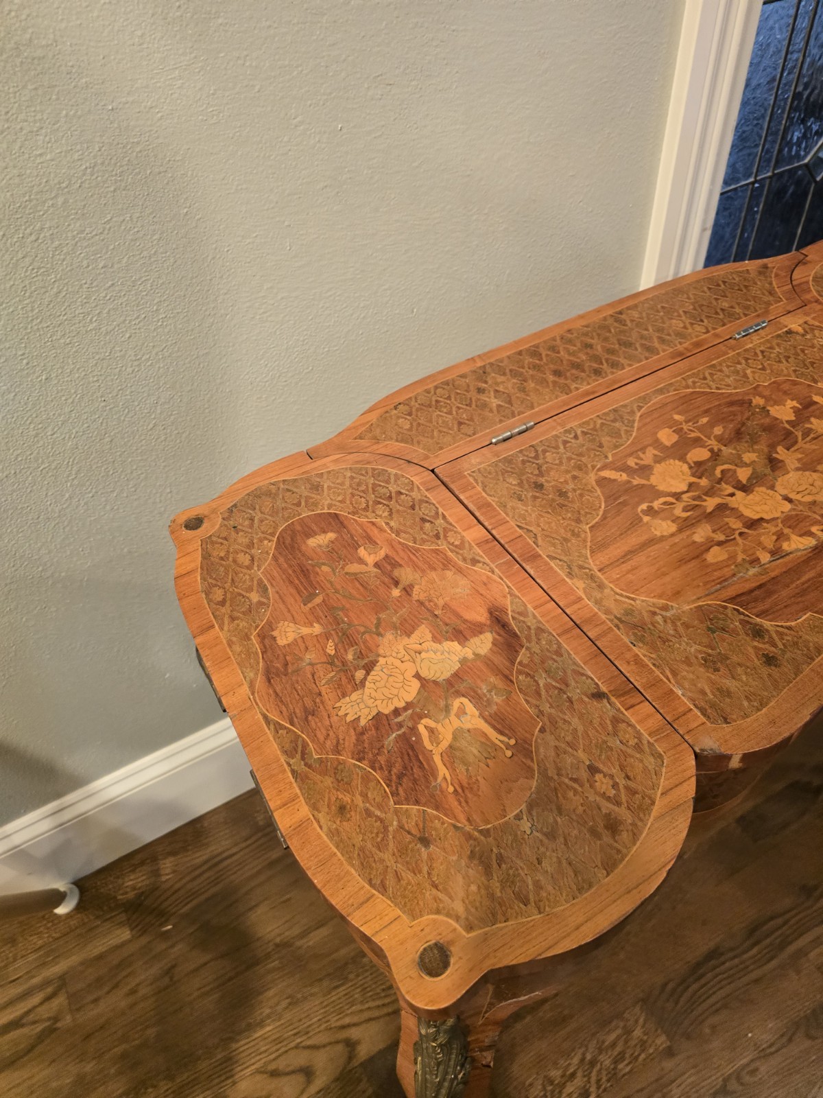"Antique vanity table from the late 1800s with intricate inlay & a hidden mirror