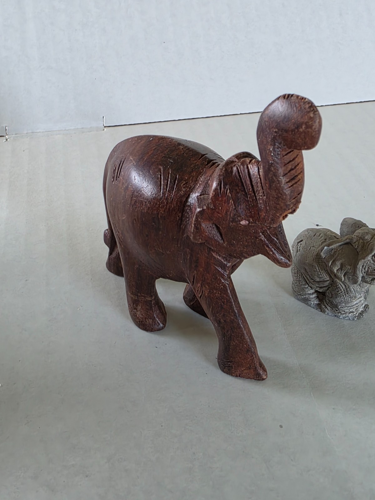 Three elephant figurines