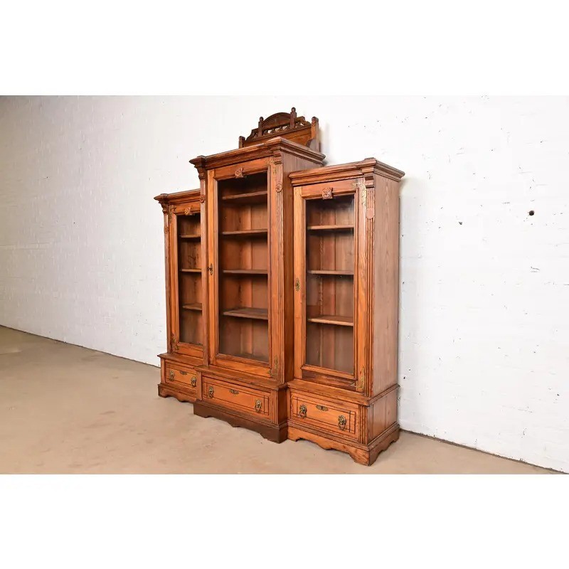 Herter Brothers Style Antique Victorian Carved Oak Bookcase Cabinet, Circa 1880s