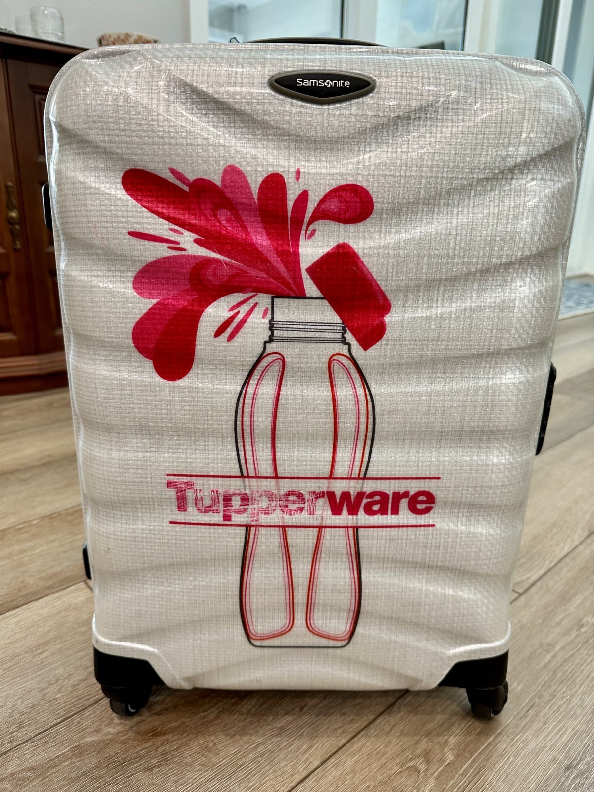 Samsonite Firelite Limited Edition for Tupperware 20” Spinner Carry-On Luggage