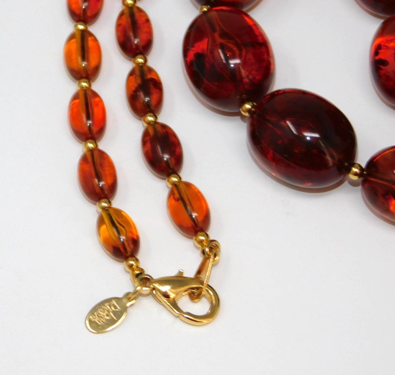 Vtg JOAN RIVERS Faux Amber Lucite Graduated Bead Necklace w/ Gold Tone Spacers