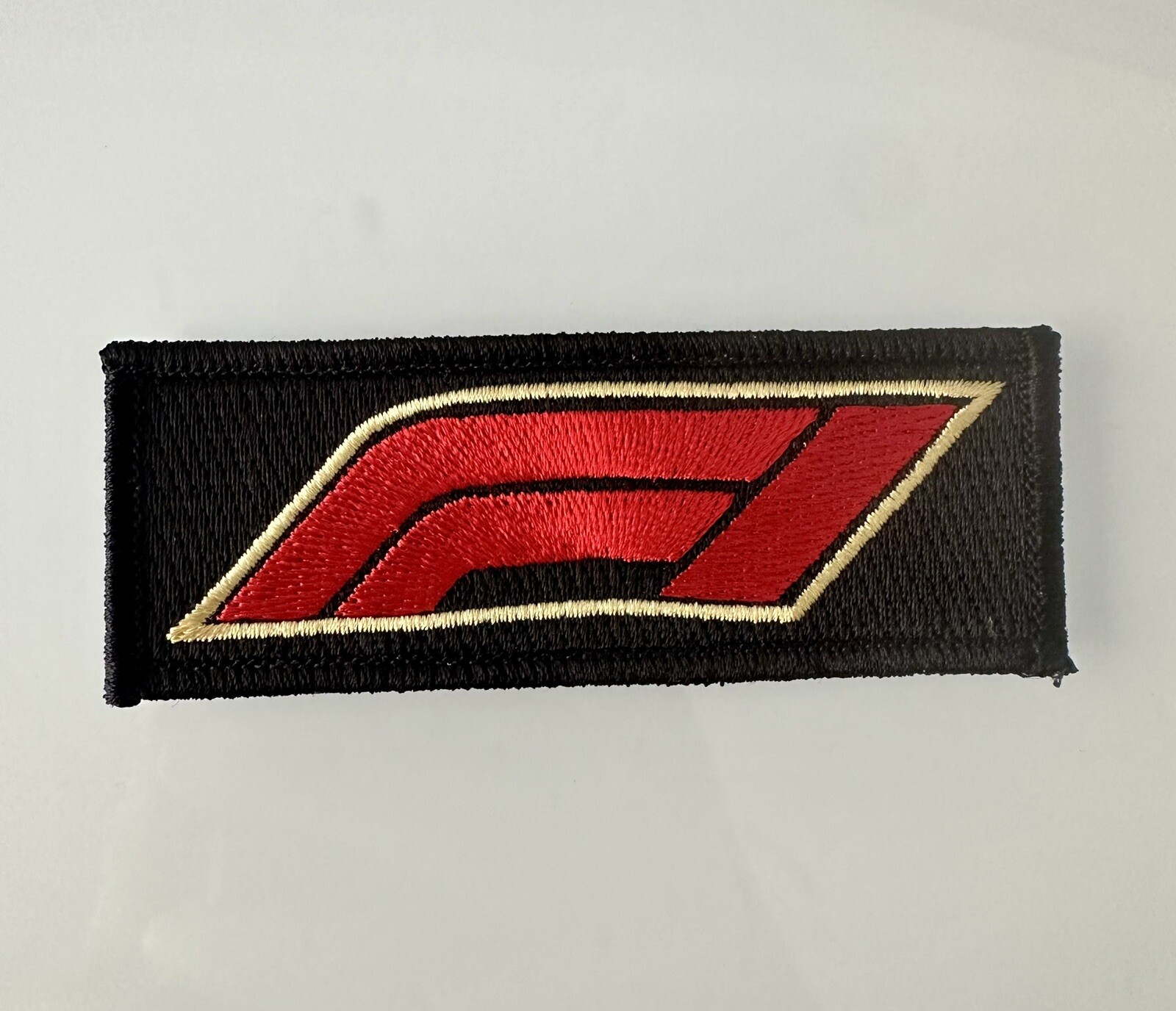 F1 RACING BLACK GOLD Iron on PATCH 1.5” H X 3” L