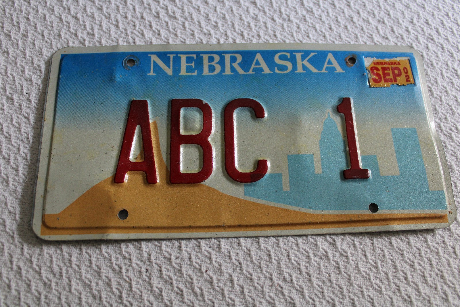 COLLECTION OF (9) NEWS/MEDIA/TV/RADIO PRESS LICENSE PLATES FROM VARIOUS STATES