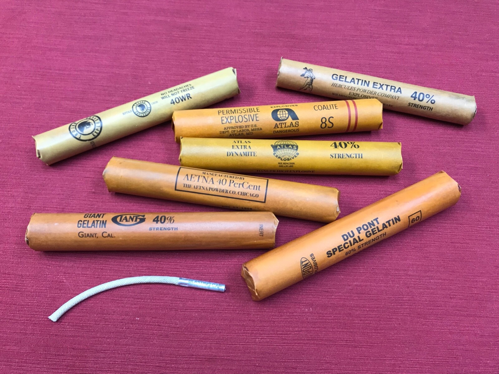 inert dynamite sticks with cap and fuse, set of 7. Great for display, movie prop