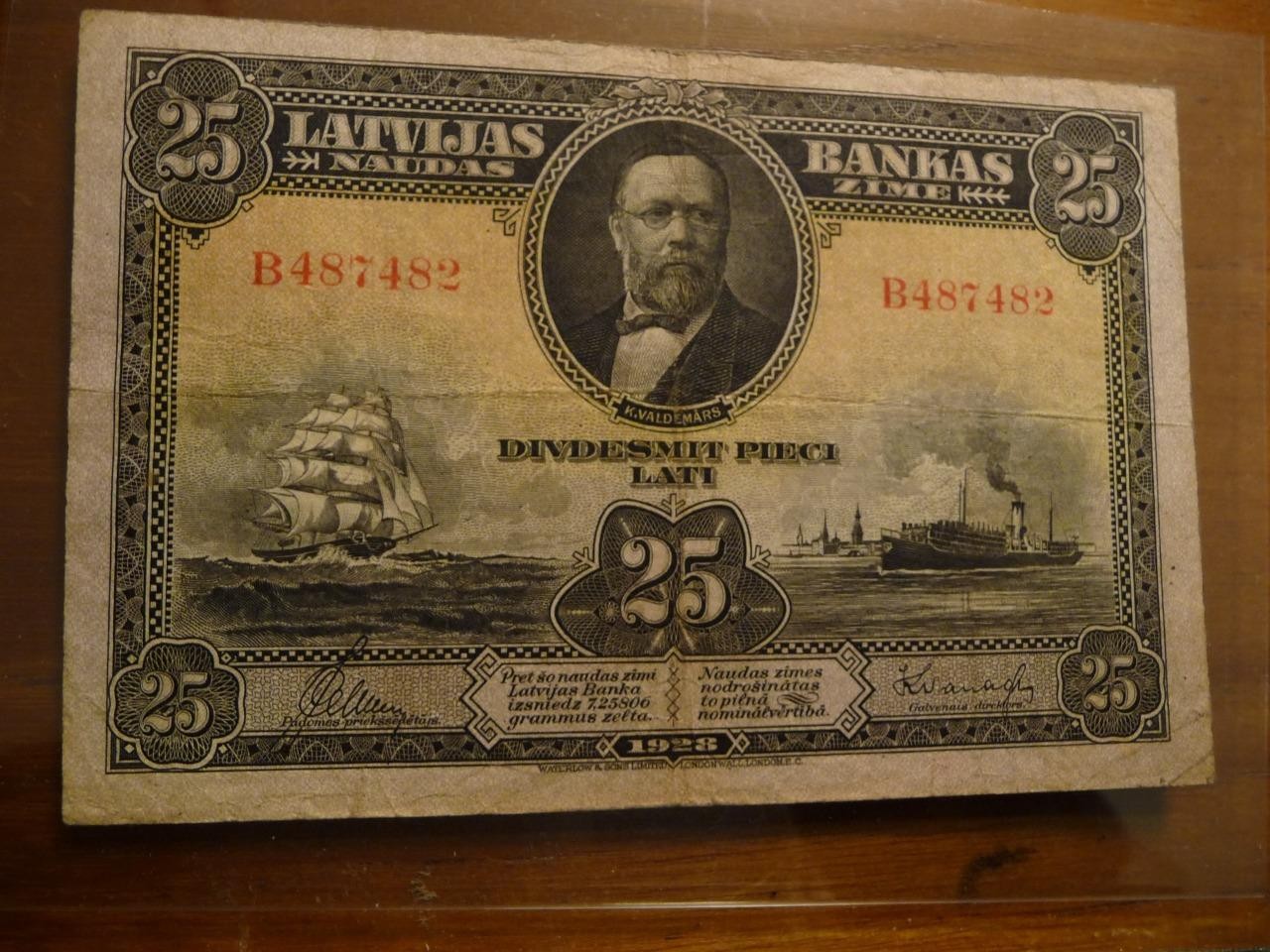 1928 Latvia 25 Latu Banknote P18a F-VF Condition SKU# 25074