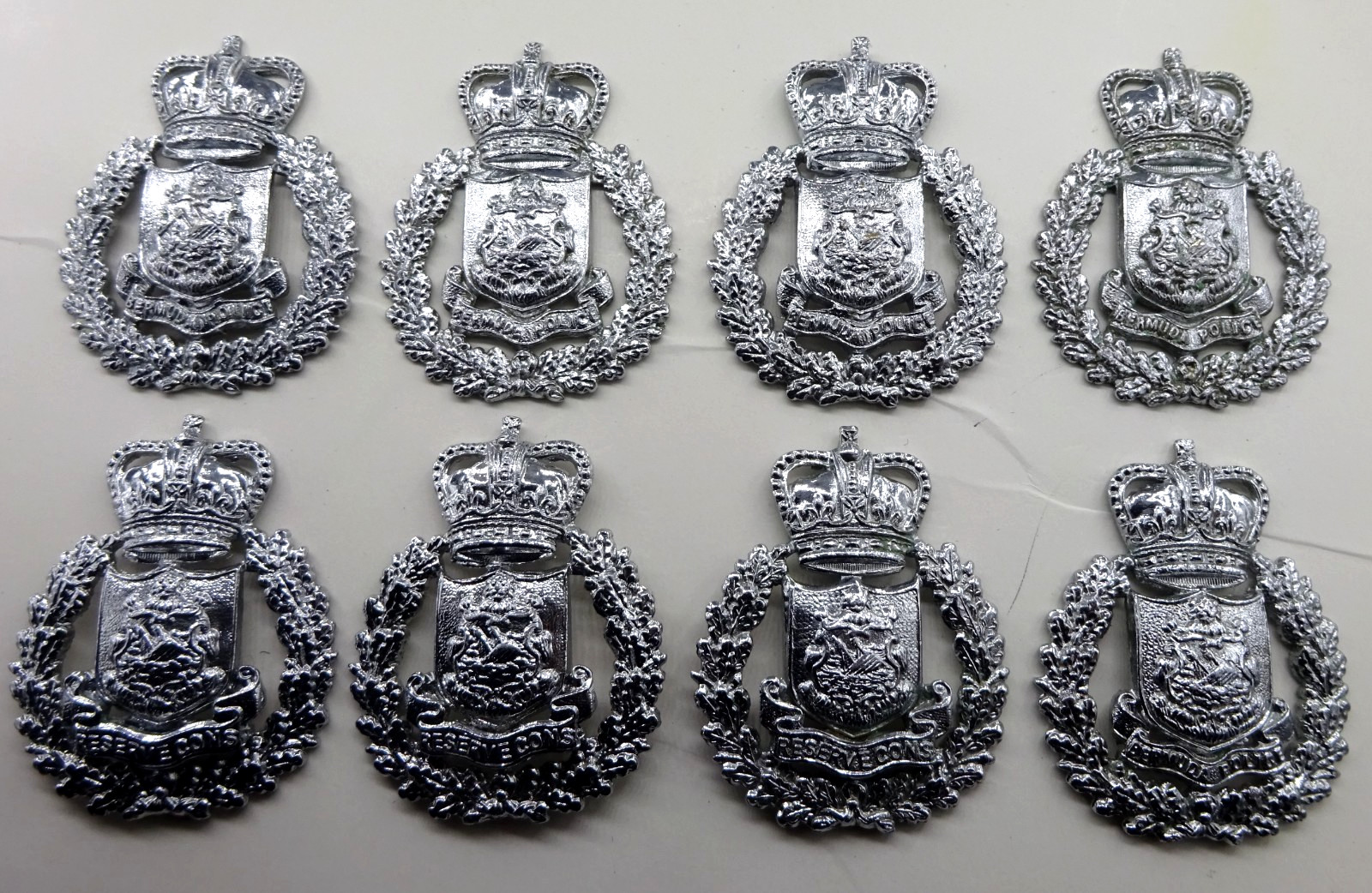 8 Vintage / Obsolete Cap Badges - 1960's-70's Bermuda Police Service + Reserves