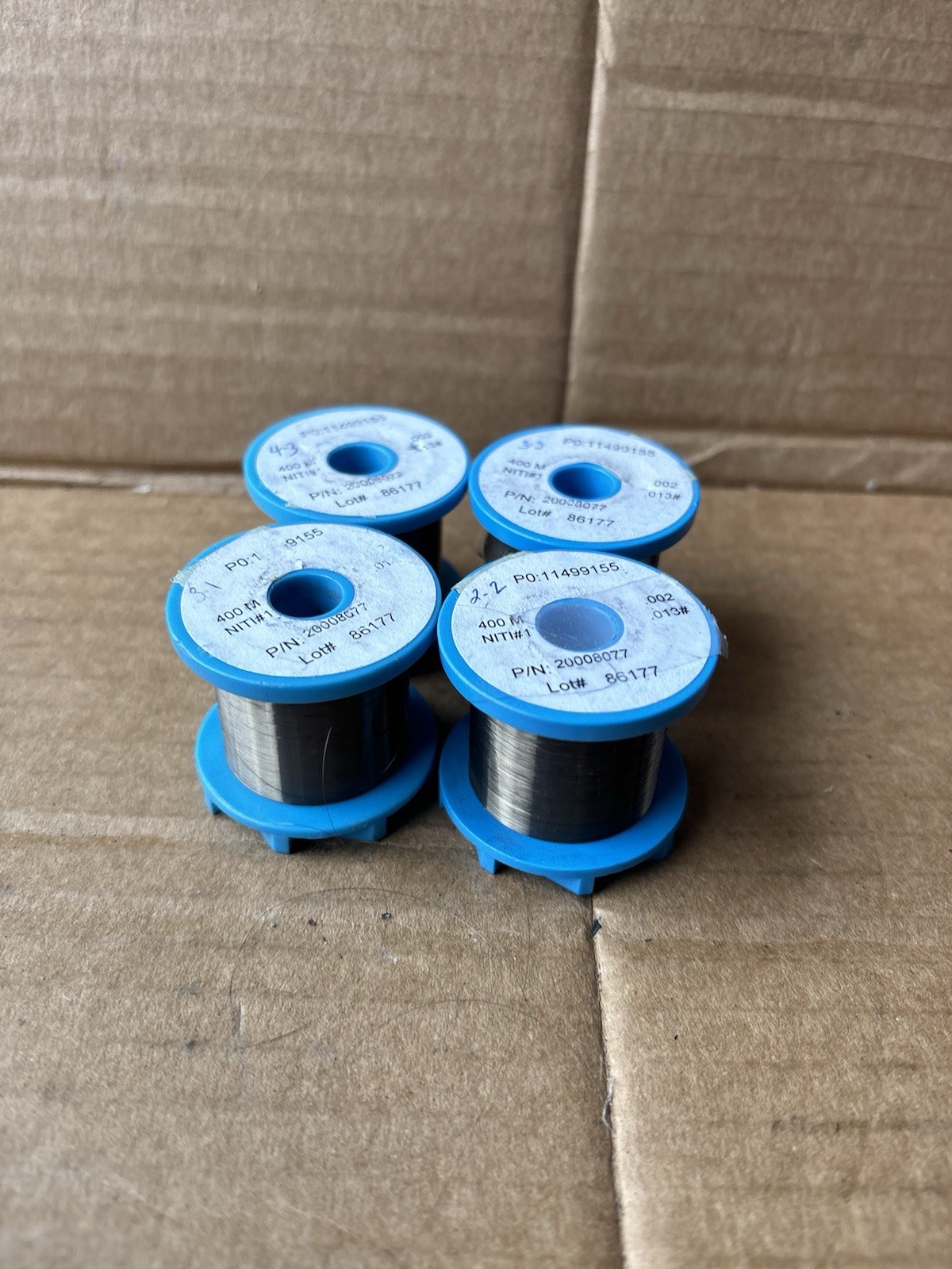 4 Spools Medical Braid Wire  PO: 11499155  400 NITI#1 End Braid Wire Used ( 4)