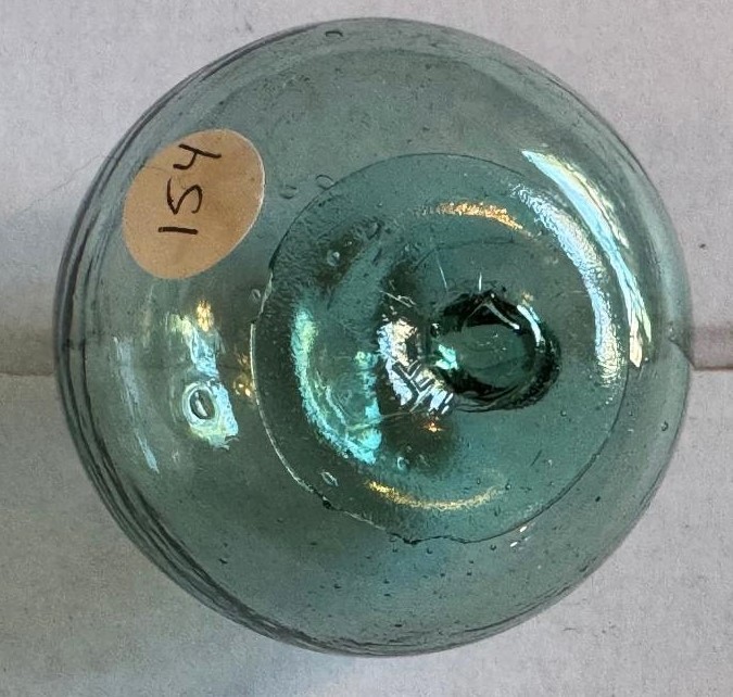 Crude aqua-green glass float, 3 1/4 inches diameter