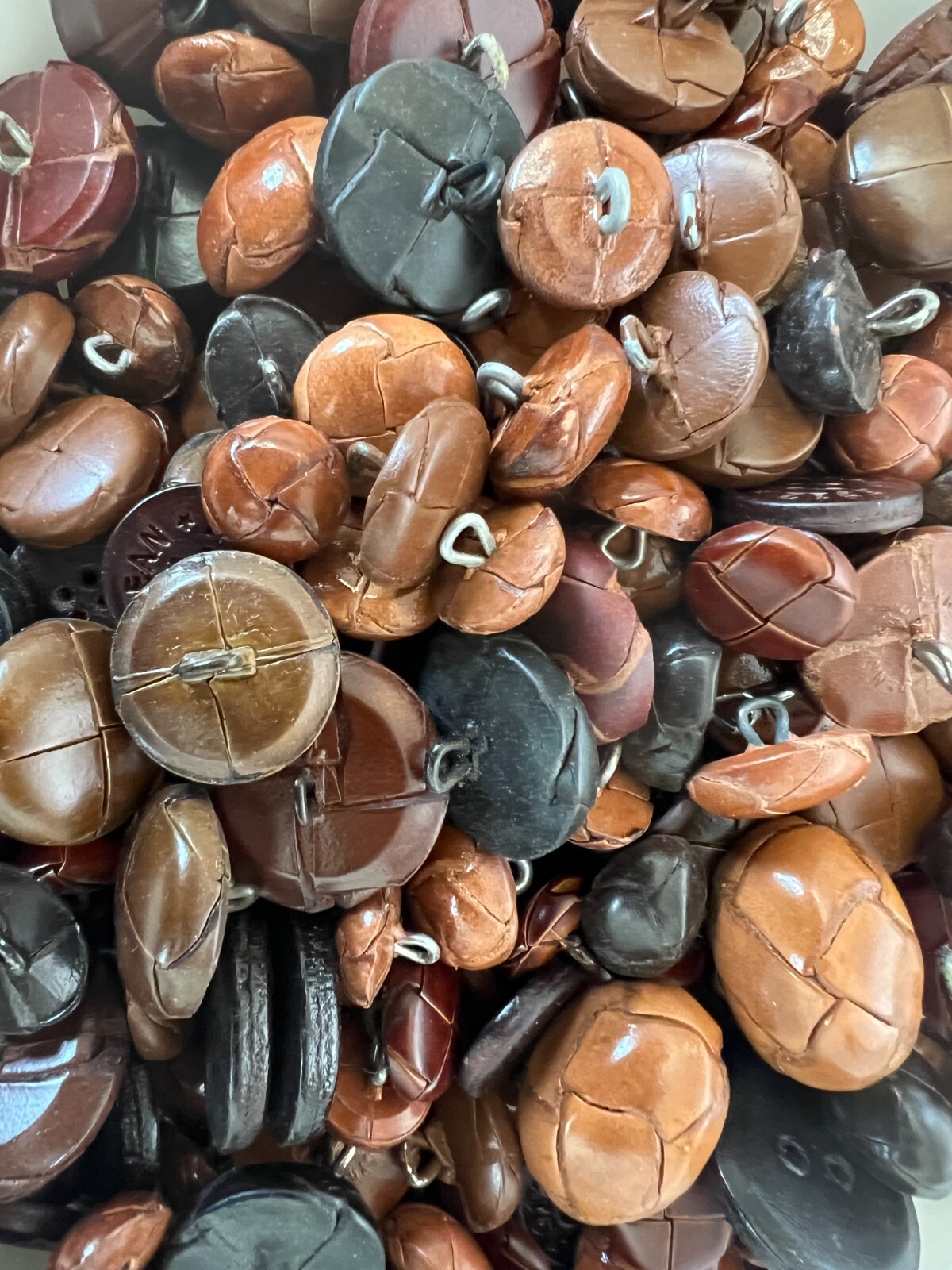 GENUINE LEATHER BUTTONS-OVERSTOCK SALE-SELLING IN ASSORTED 12 LB LOTS