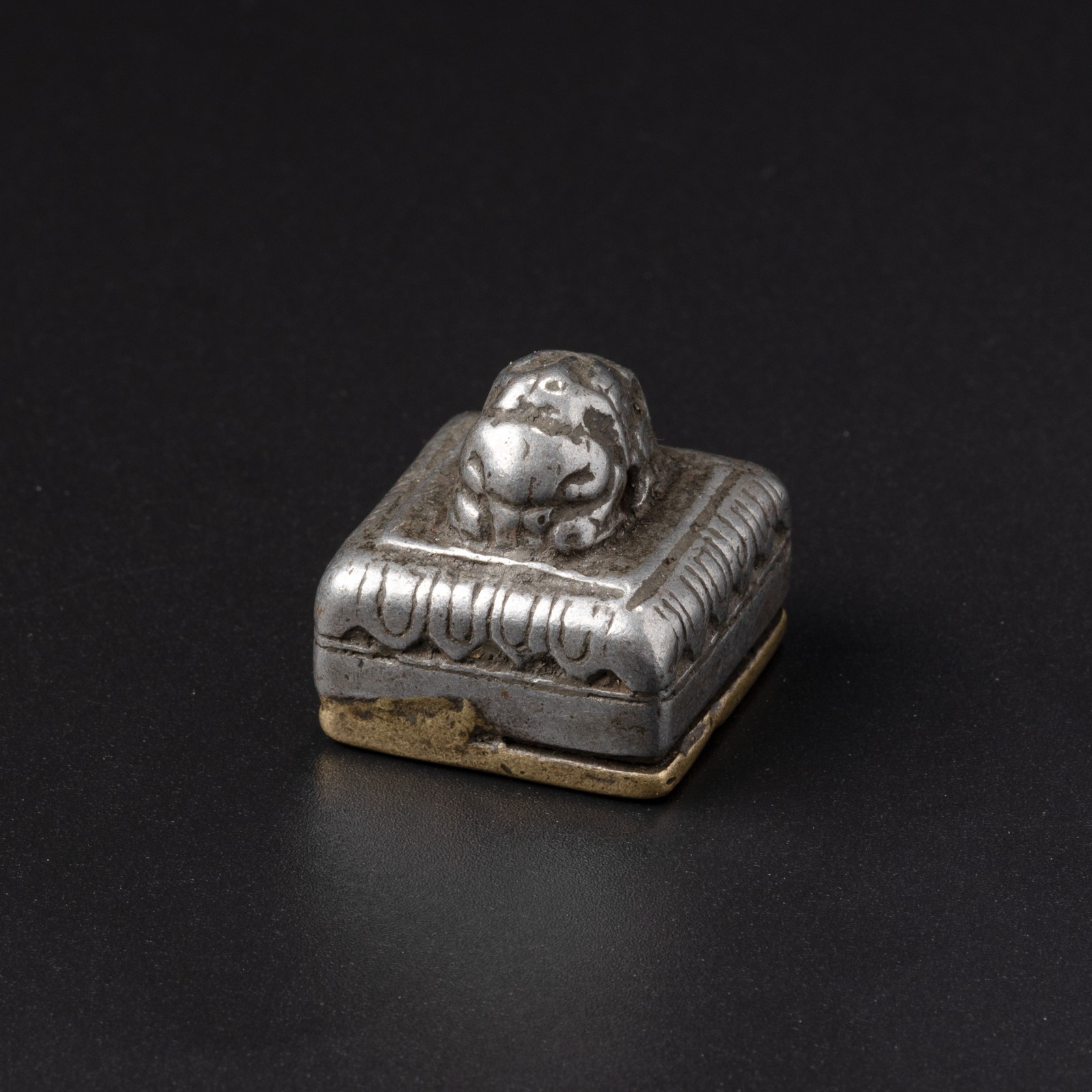 Tibetan Bronze and Iron Seal with Conch Motif