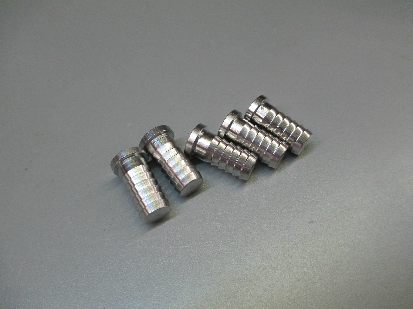 (5) 3/8" BARB PLUGS. STAINLESS STEEL FITTINGS 1002120