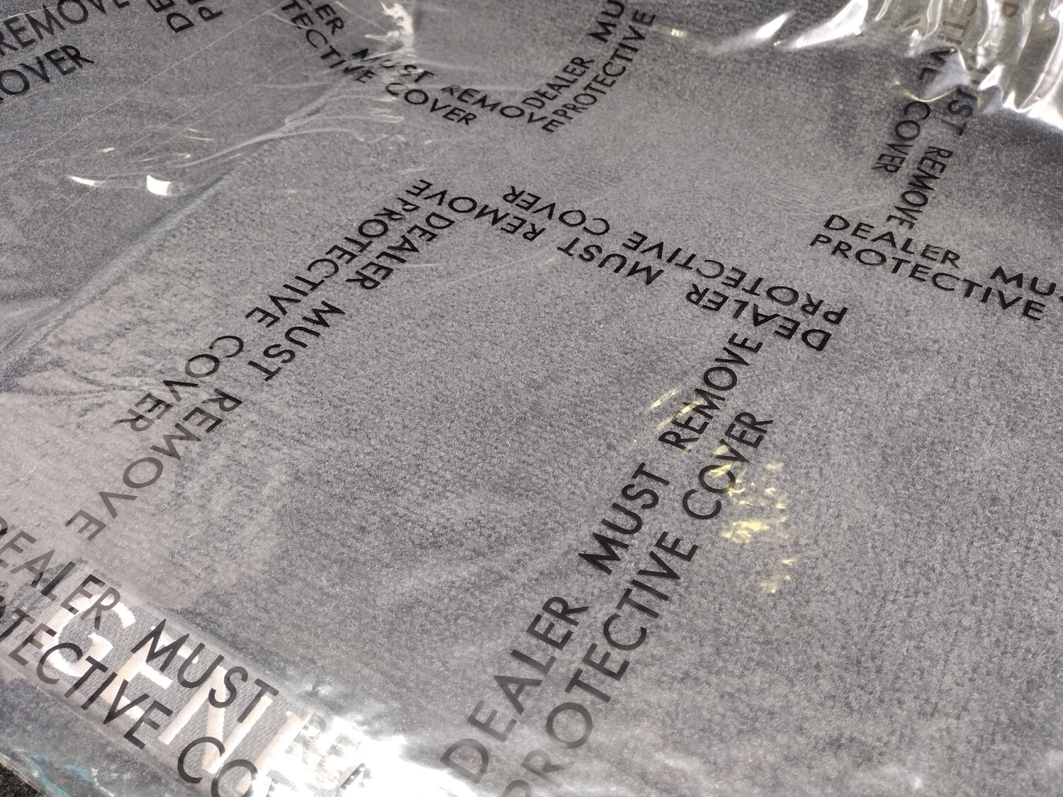 Adhesive Plastic "Dealer Must Remove" Car Floor Mats 4 MIL 24 IN x 600 FT Roll